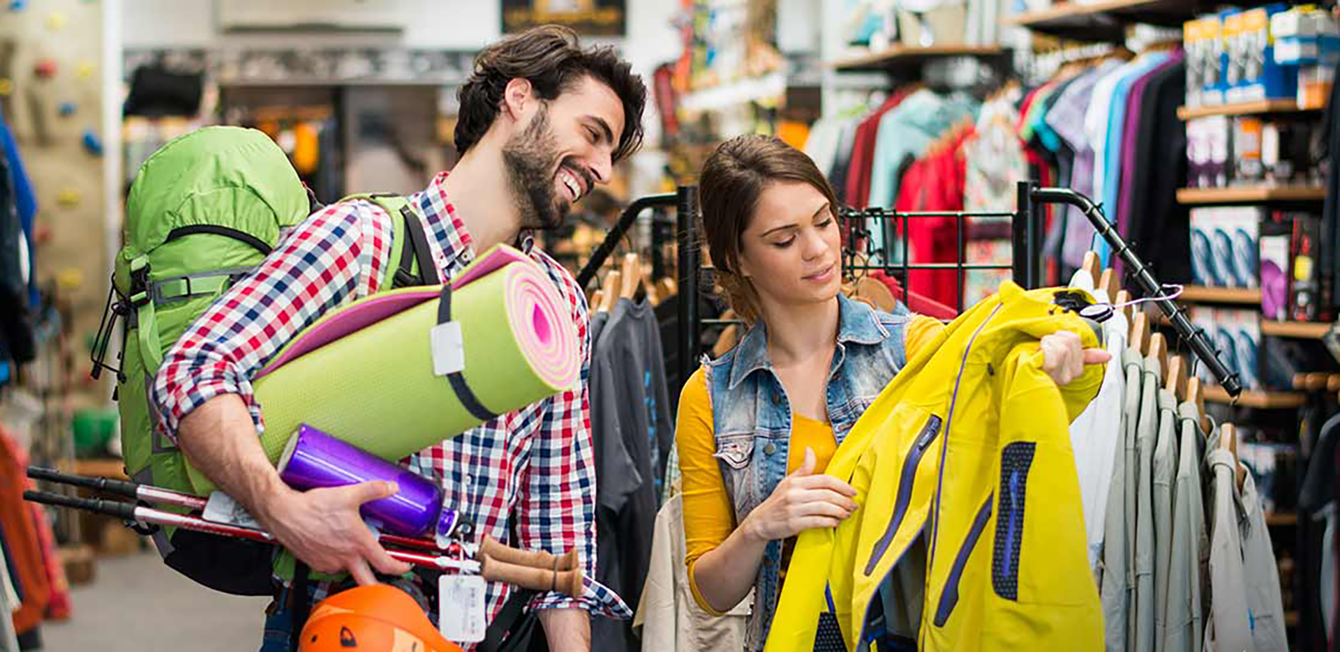 A couple shopping for camping supplies.