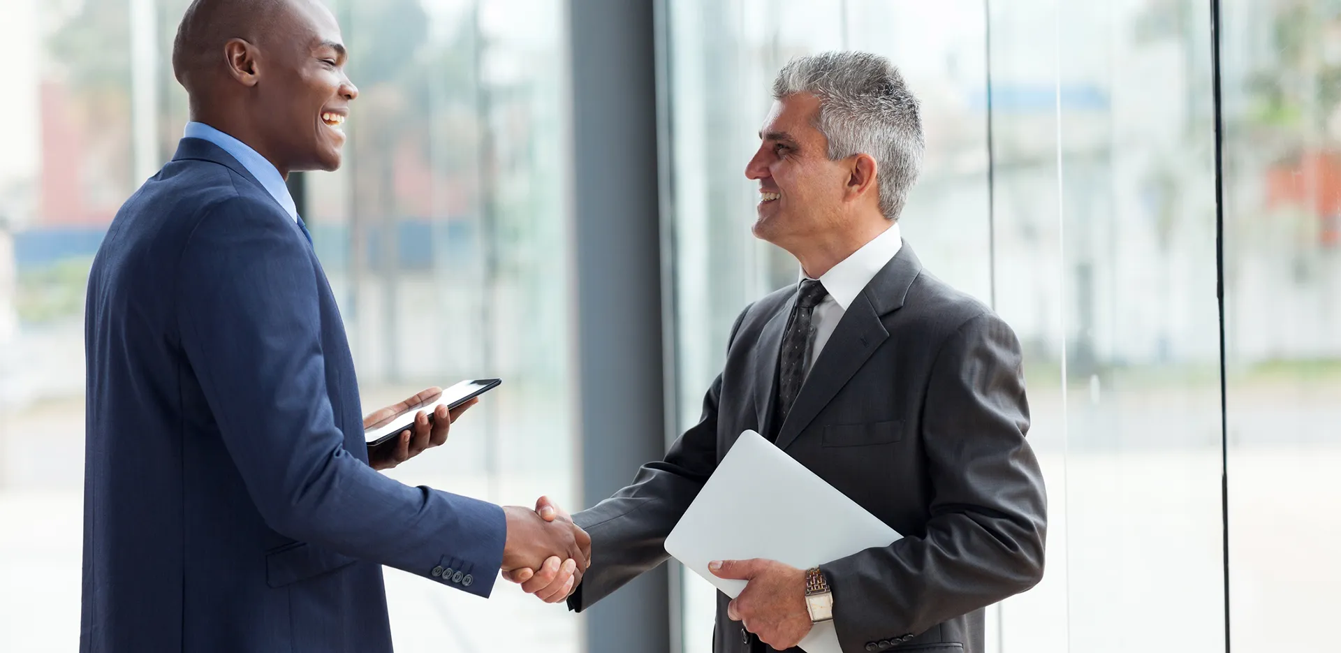Two professionals shaking hands.