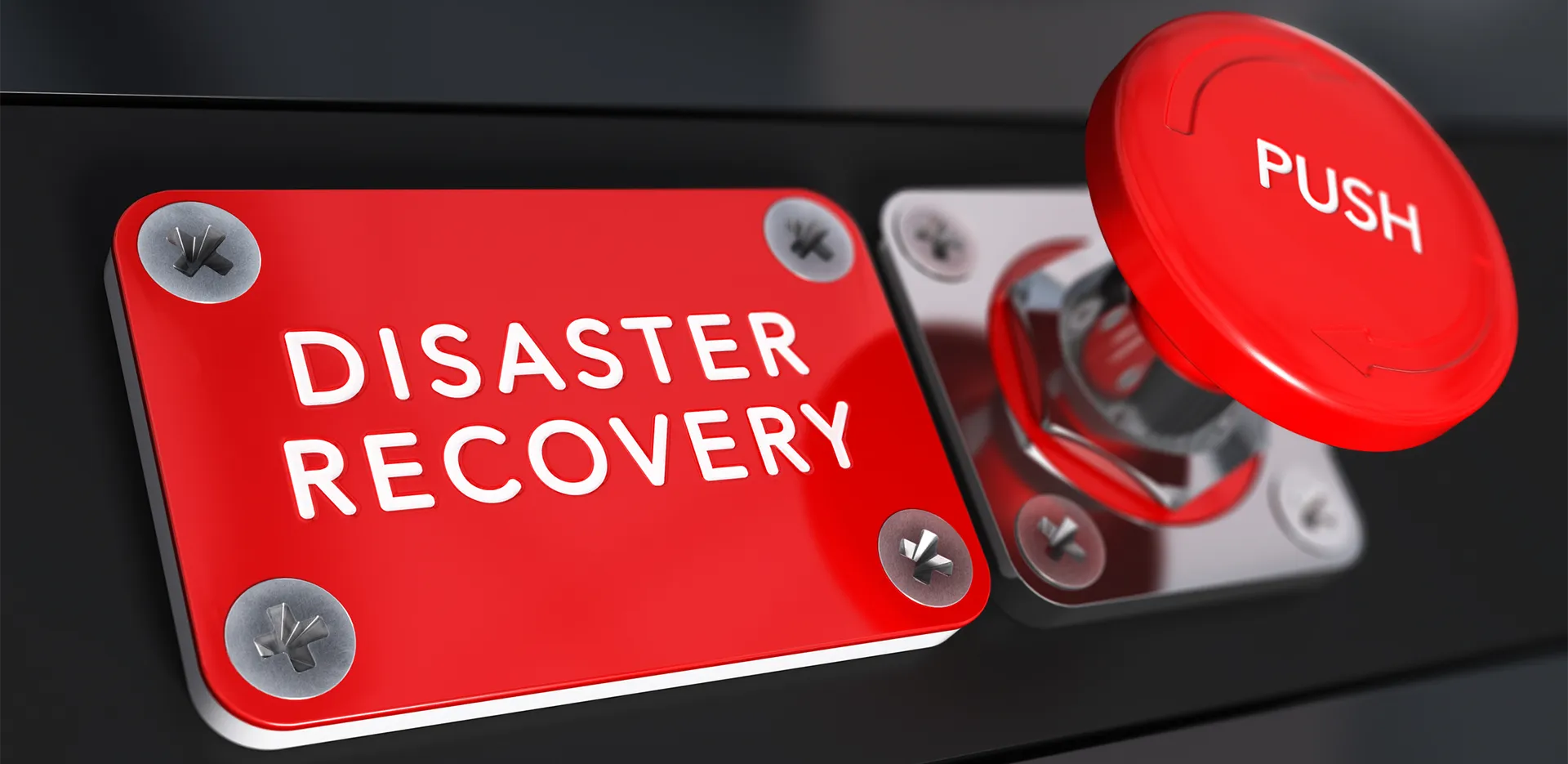 Concept of a sign reading 'Disaster Recovery' next to a large red button labeled 'push.'