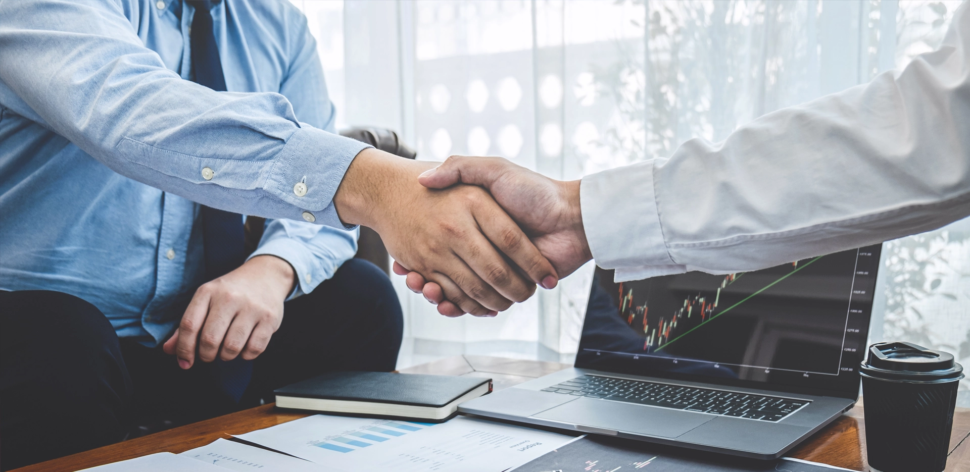 two businessmen shaking hands