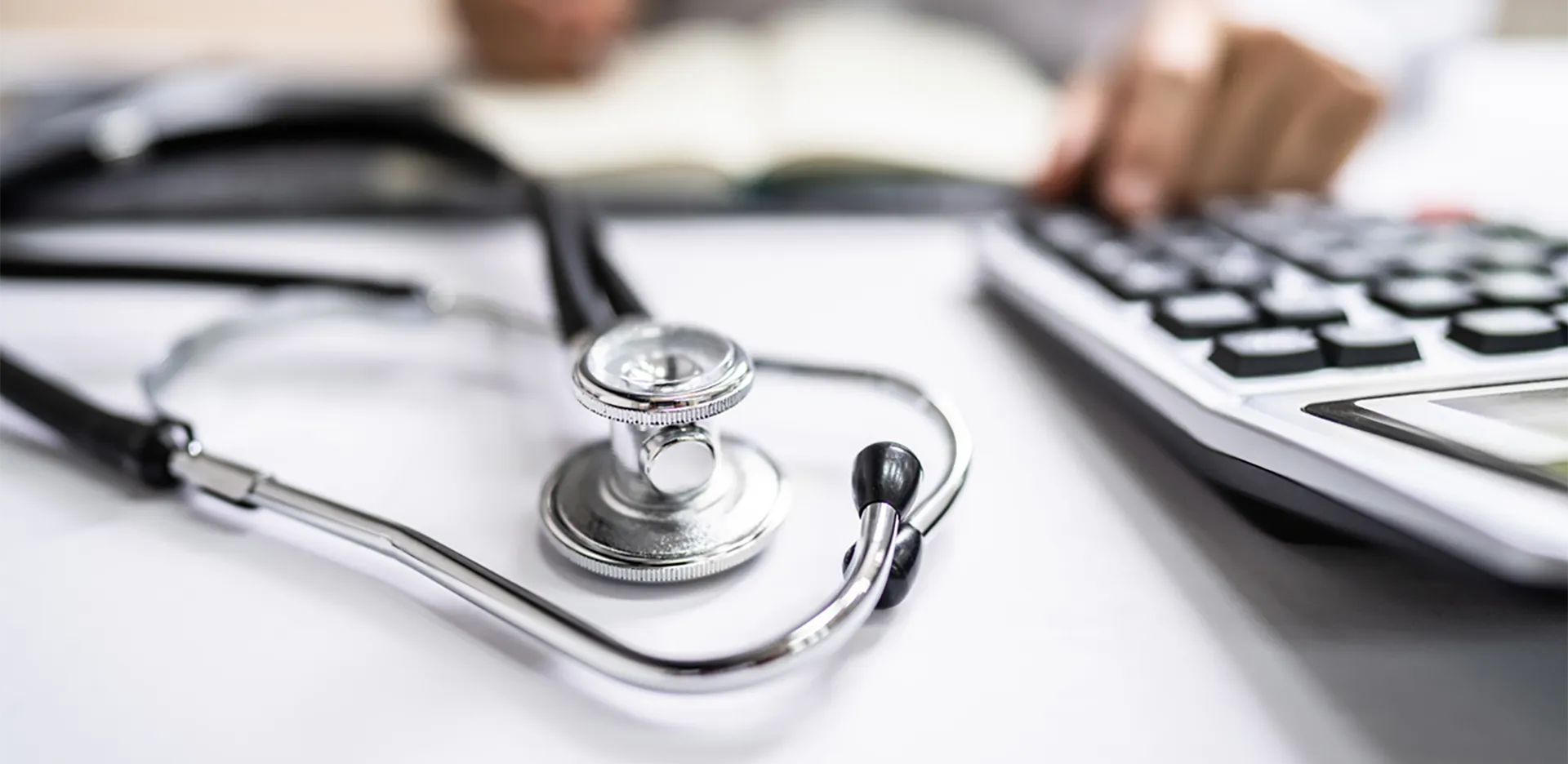 A stethoscope and a calculator.