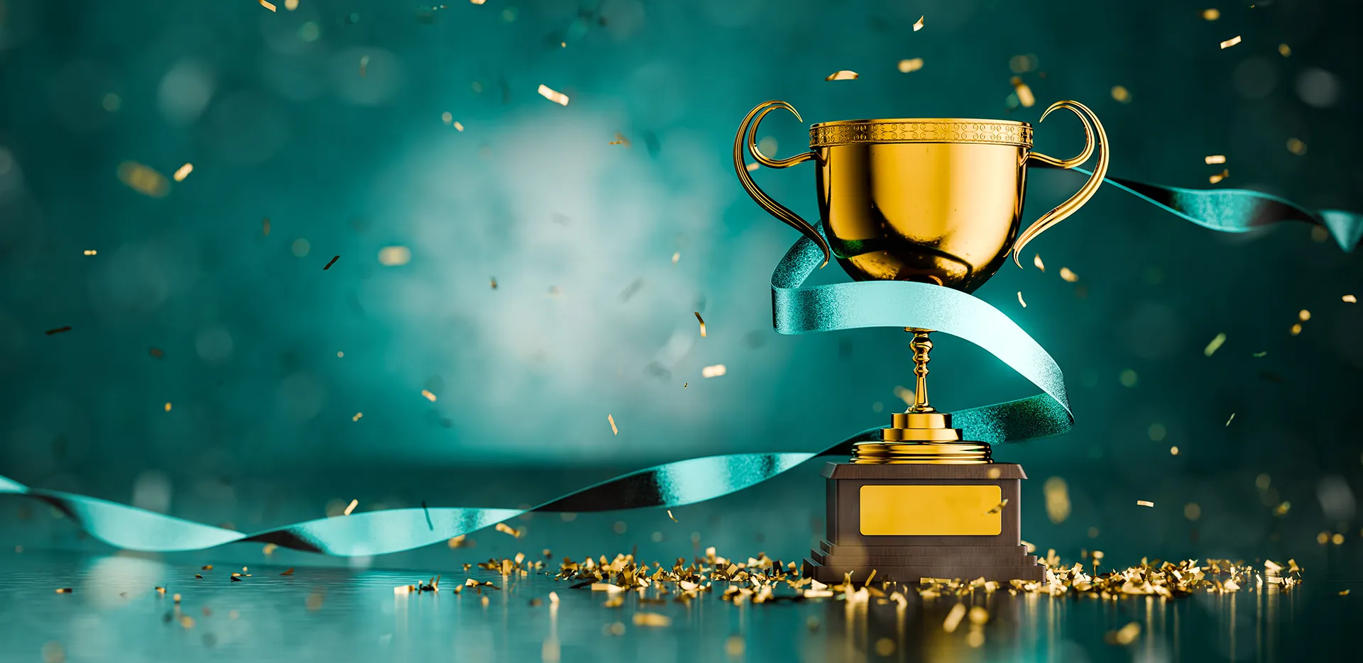 A gold trophy wrapped in blue ribbon.