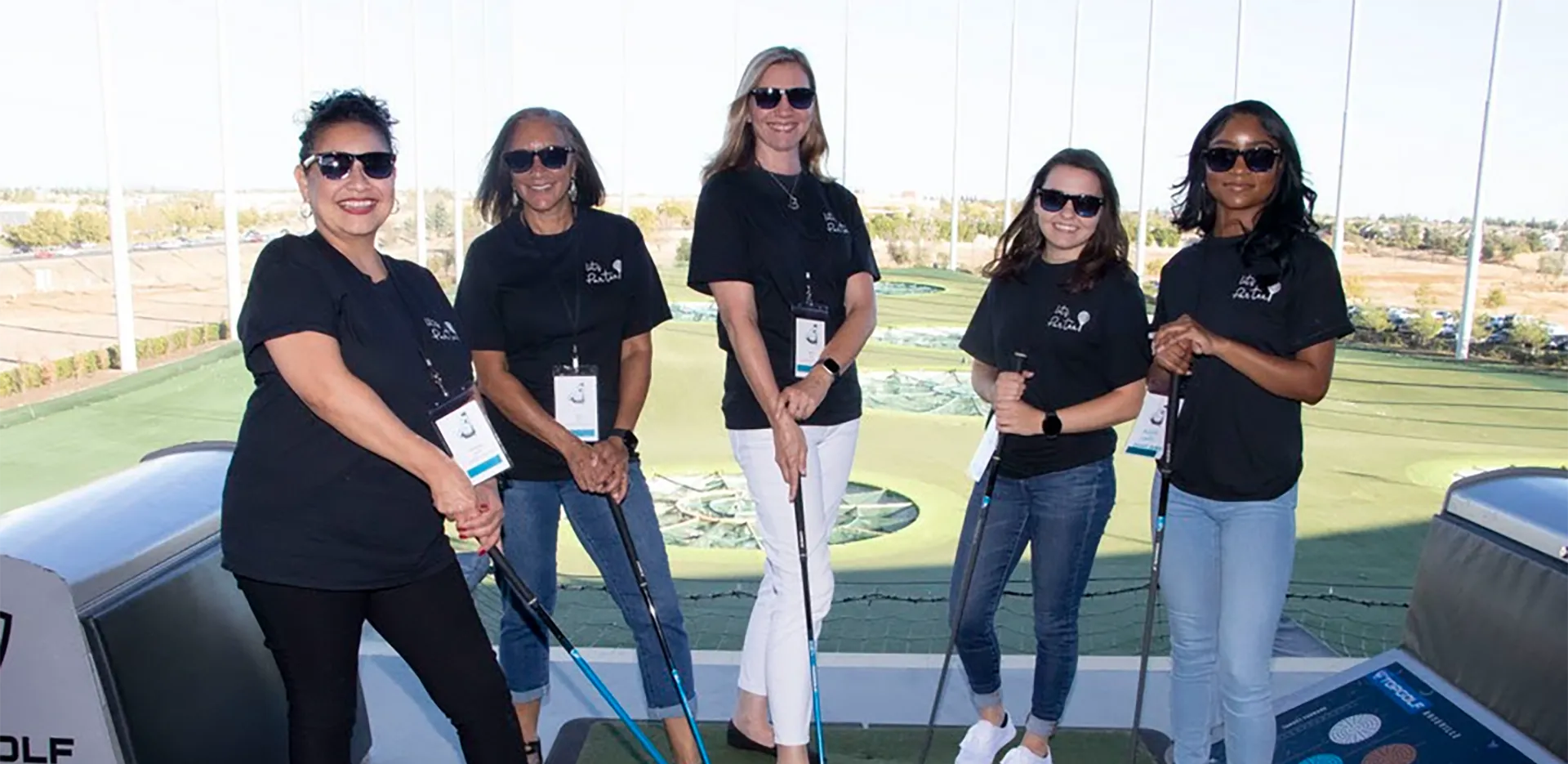 A group of InterWest team members at Top Golf.