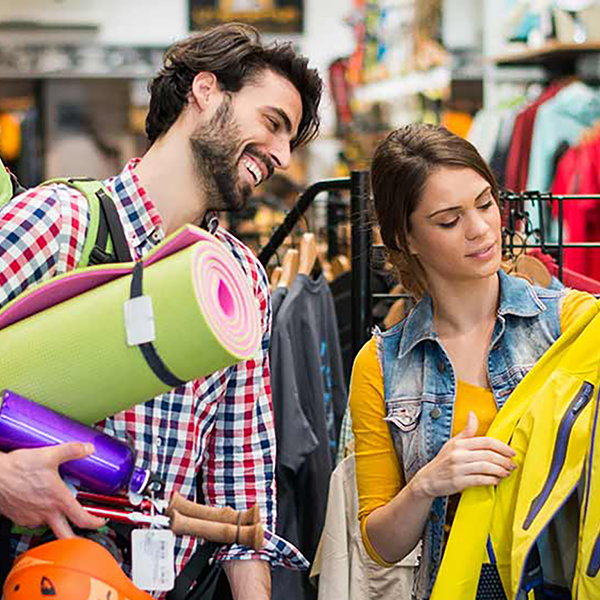 A couple shopping for camping supplies.