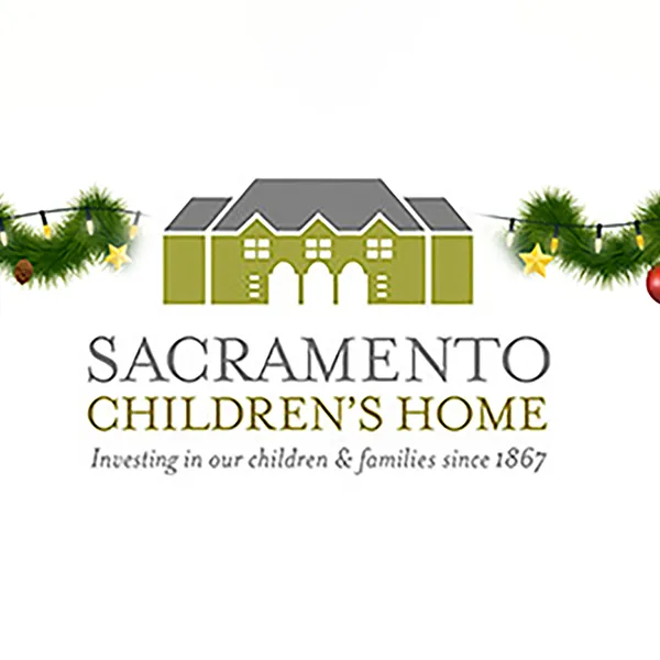Logo for 'Sacramento Children's Home' with a garland around it.