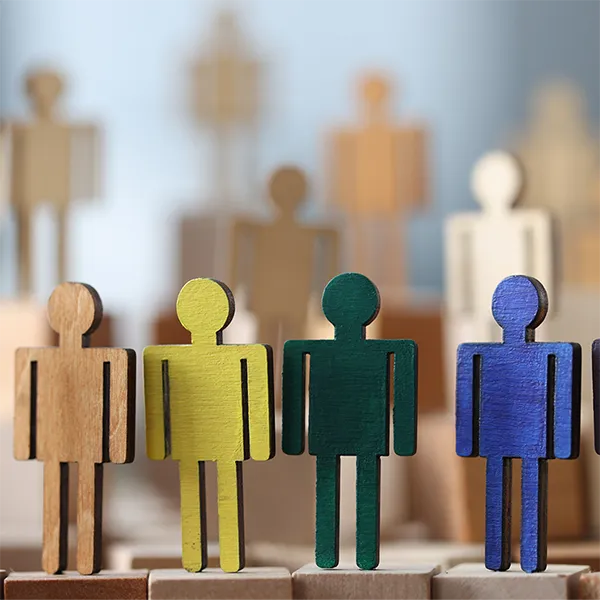 Colorful wooden blocks shaped like people.