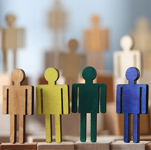 Colorful wooden blocks shaped like people.