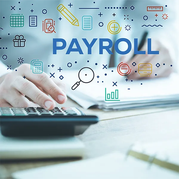 A person using a calculator. The word 'payroll' is in the foreground.