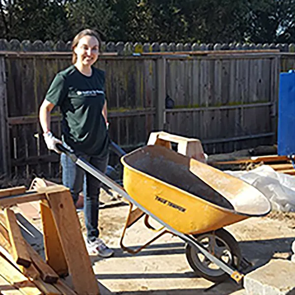 InterWest team members in front of a home under construction.