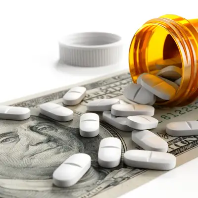 medicine pills and money
