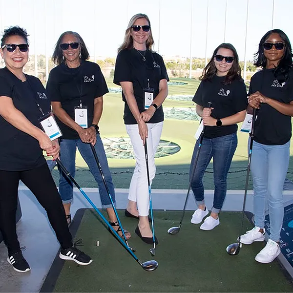A group of InterWest team members at Top Golf.