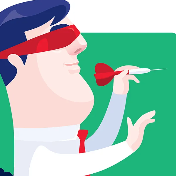 A man wearing a blindfold playing darts.