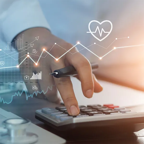 A person using a calculator with artistic renderings of line graphs.