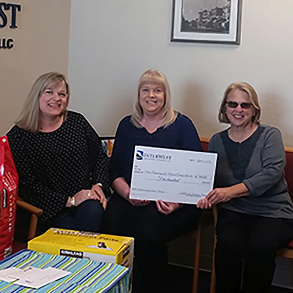 InterWest team members with donations for New Beginnings for Merced County Animals.