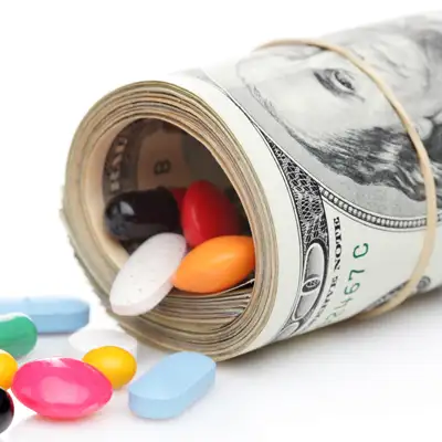 pills and rolled money