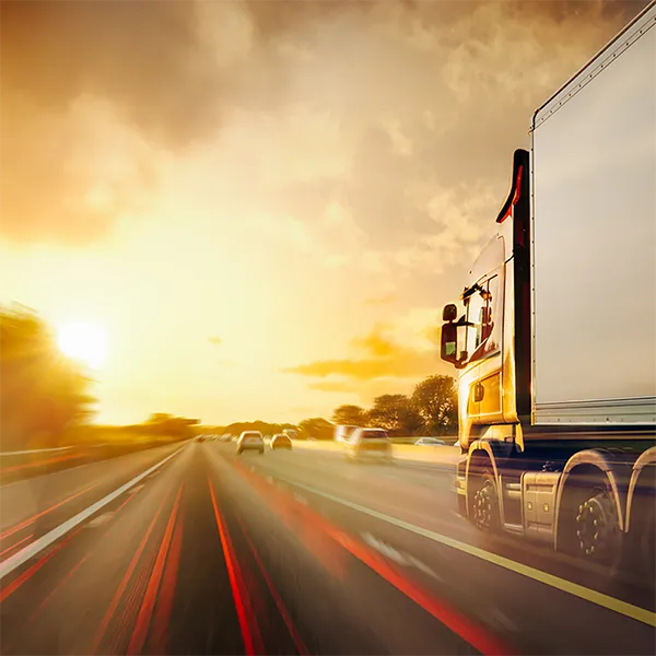 A big rig vehicle driving down the highway.
