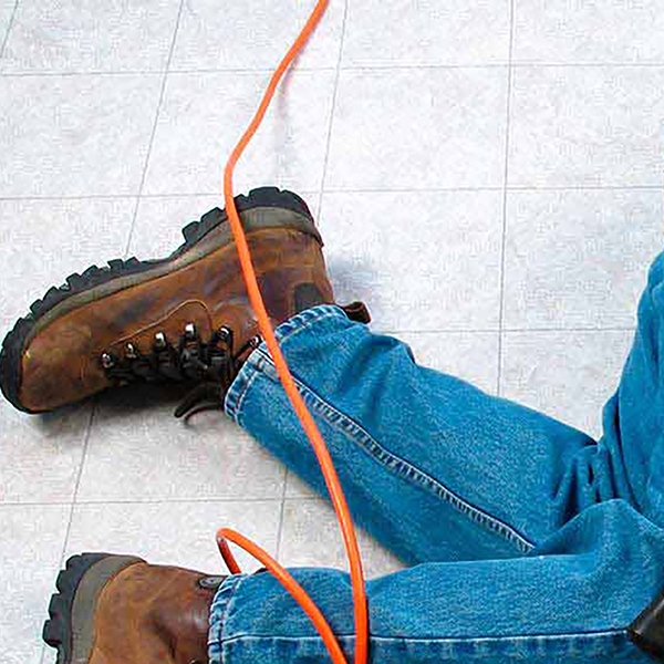 A person wearing jeans and a toolbelt has fallen.