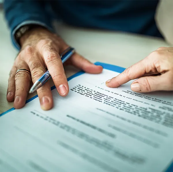 A person signing a business owners policy.