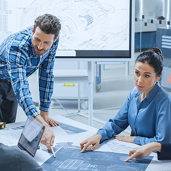 A group of professionals reviewing patented plans.