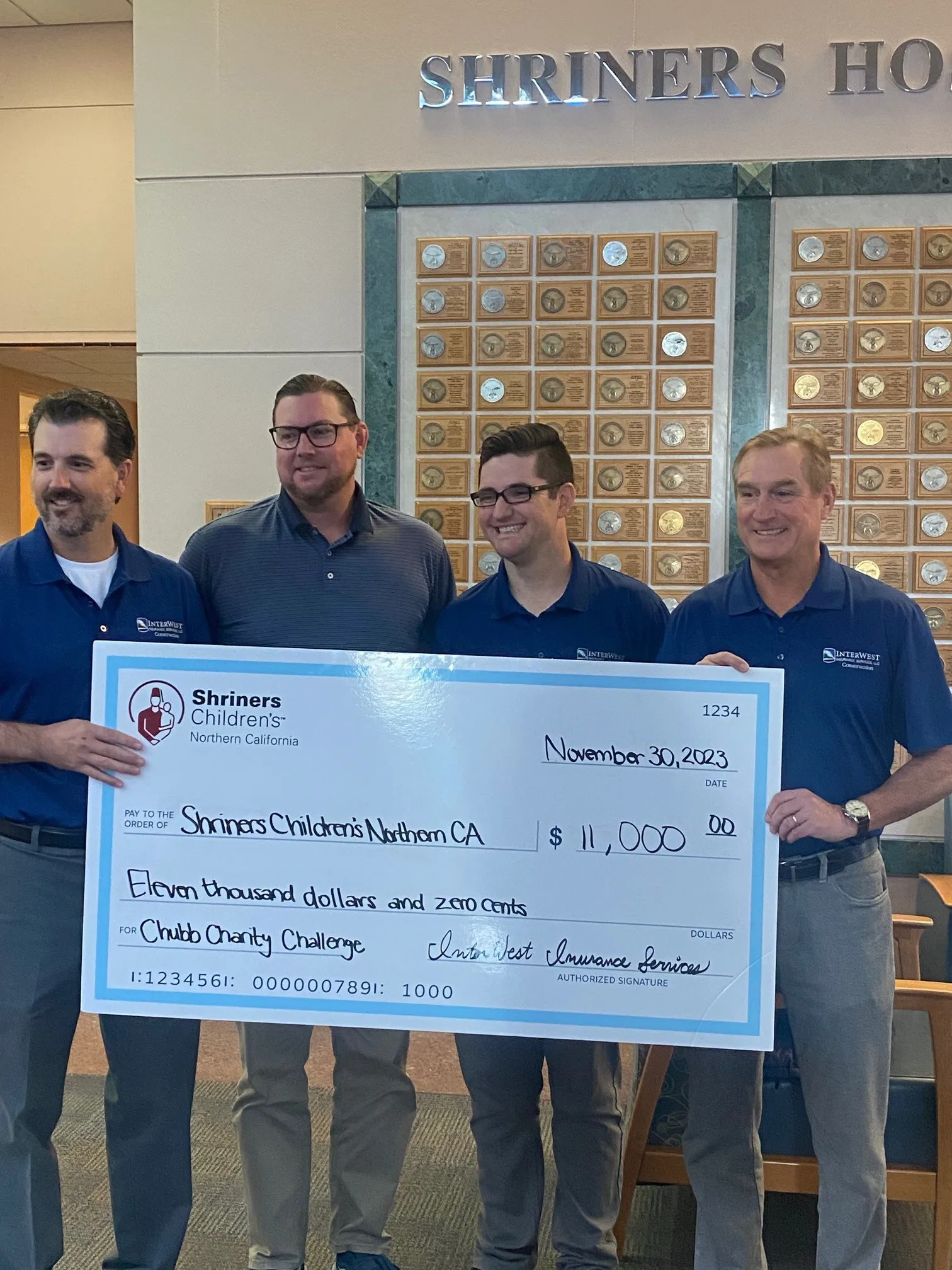 Chubb – InterWest Team with large check