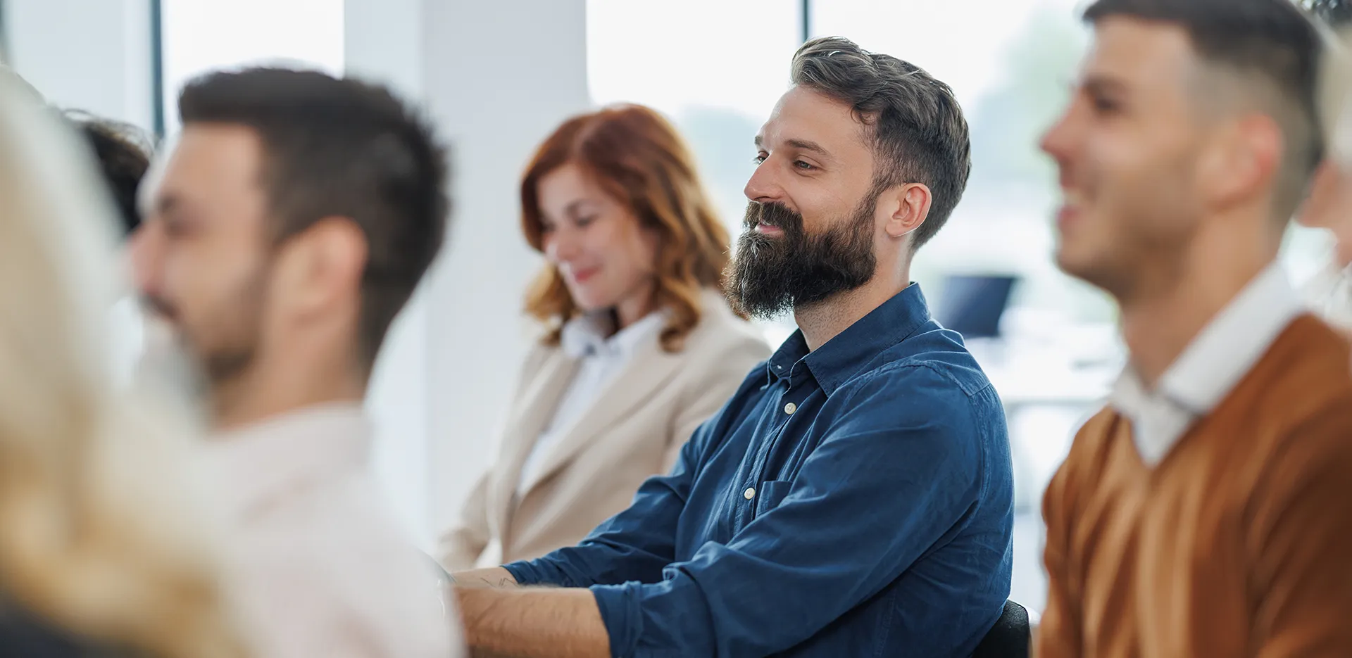 two women discussing work on a ipad