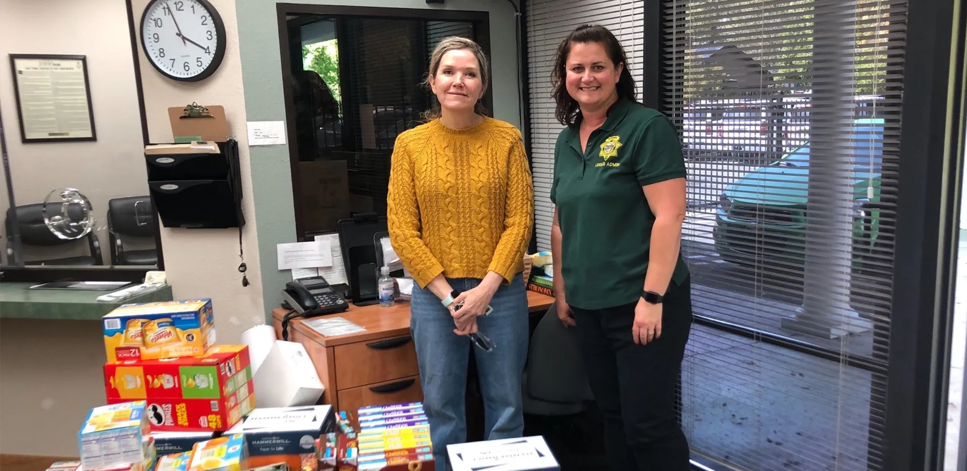 InterWest team members with donations for Seniors First/Meals on Wheels in Roseville.