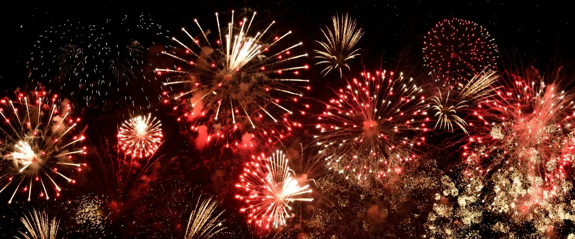 New Year's fireworks on a dark sky
