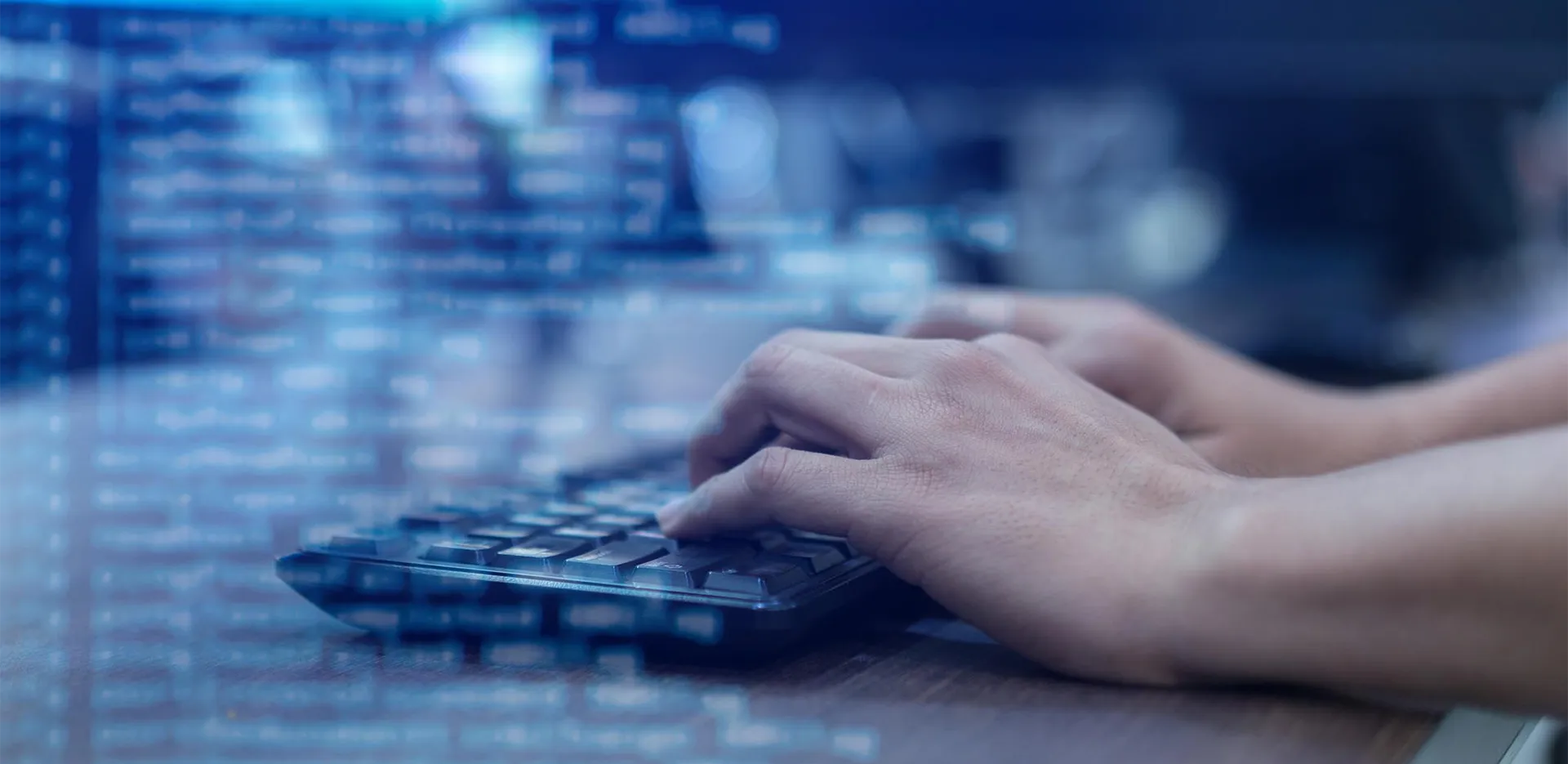 Someone typing on a keyboard.