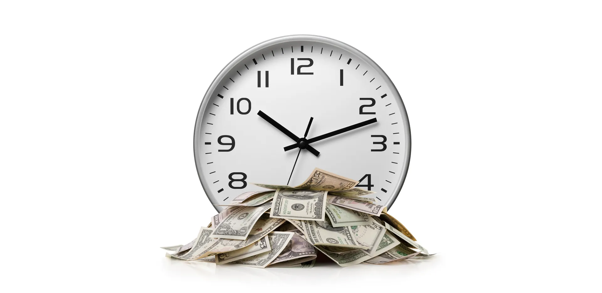 A pile money in front of a clock.
