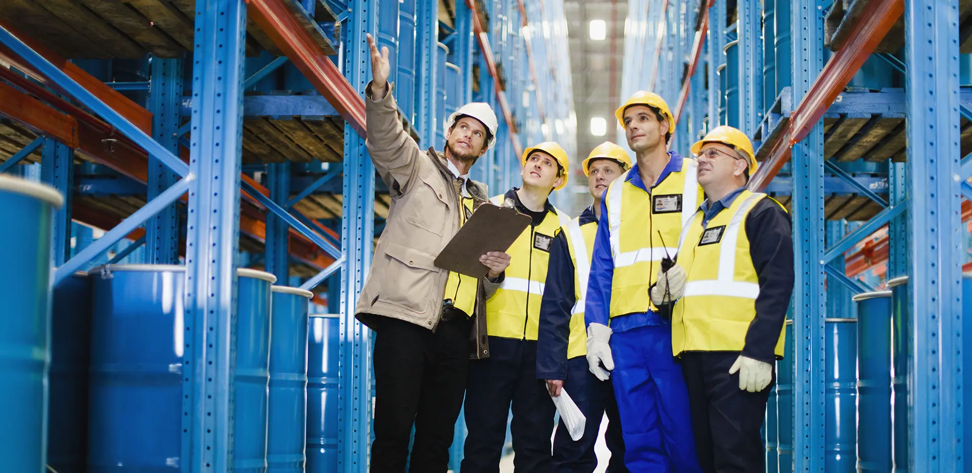 A group of safet professionals in a warehouse