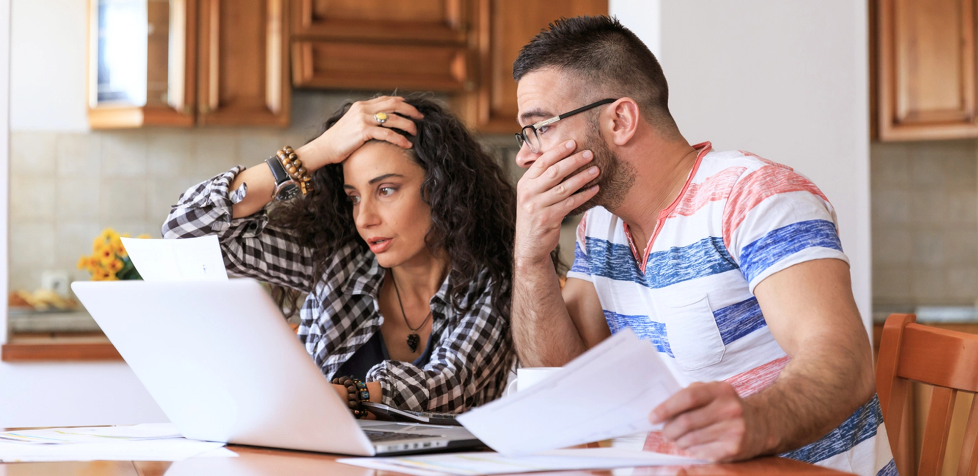 medical bills, couple surprised looking at their medical bill online