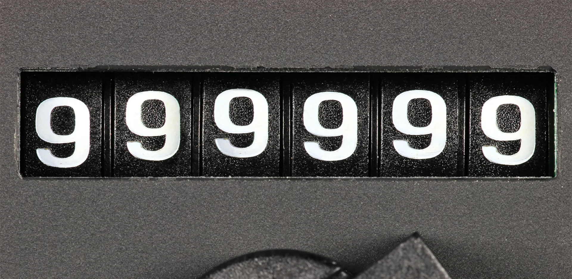 An odometer that reads 999,999.