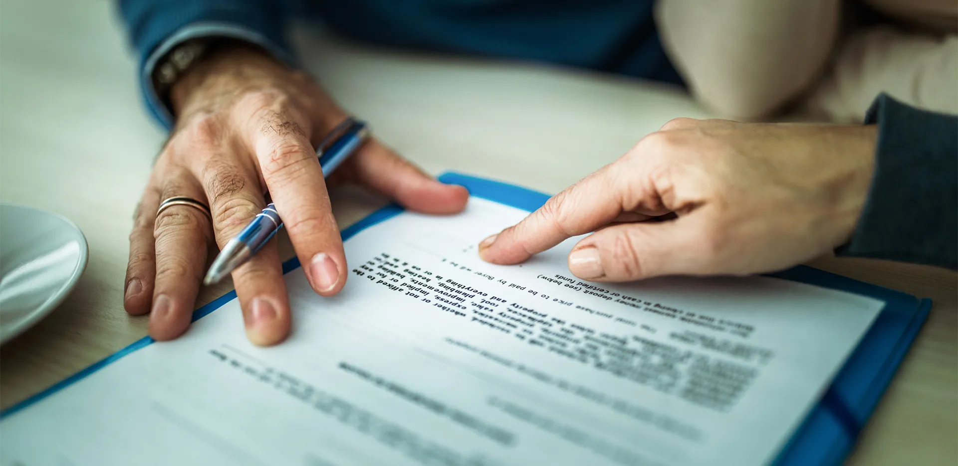 A person signing a business owners policy.