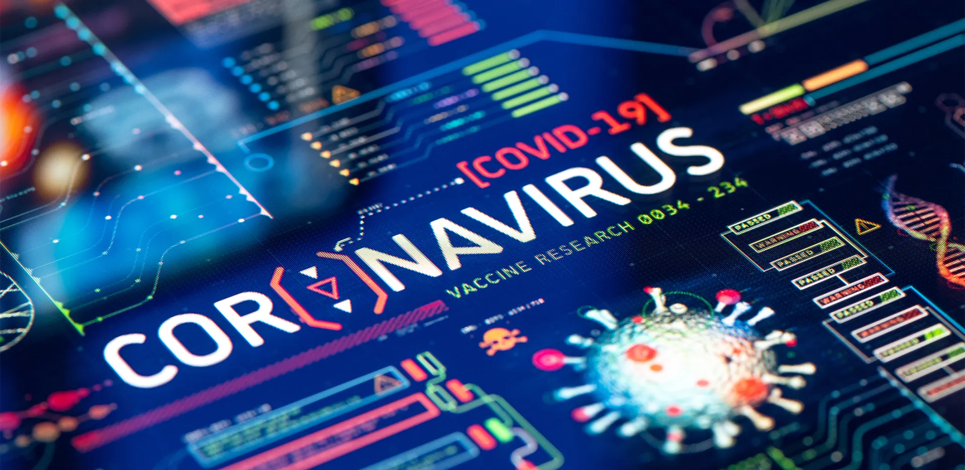A close-up of a screen reading 'Coronavirus' surrounded by related symbols.