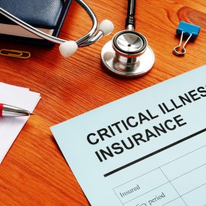 Critical Illness Insurance form and stethoscope.