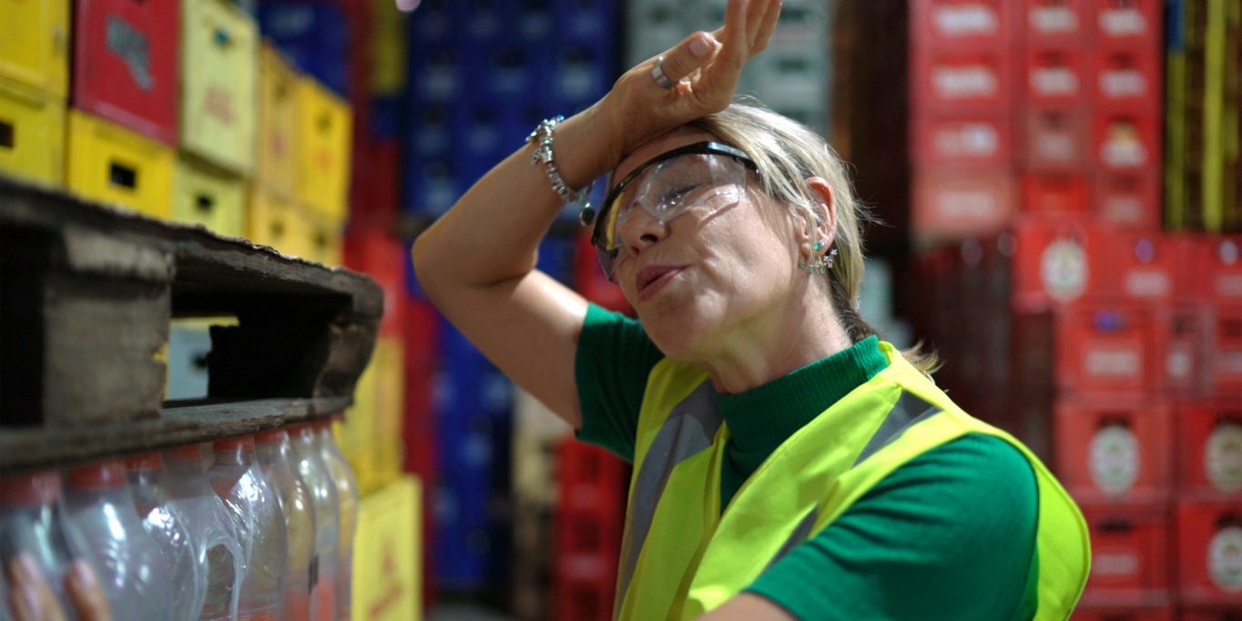 Exhausted employee at warehouse